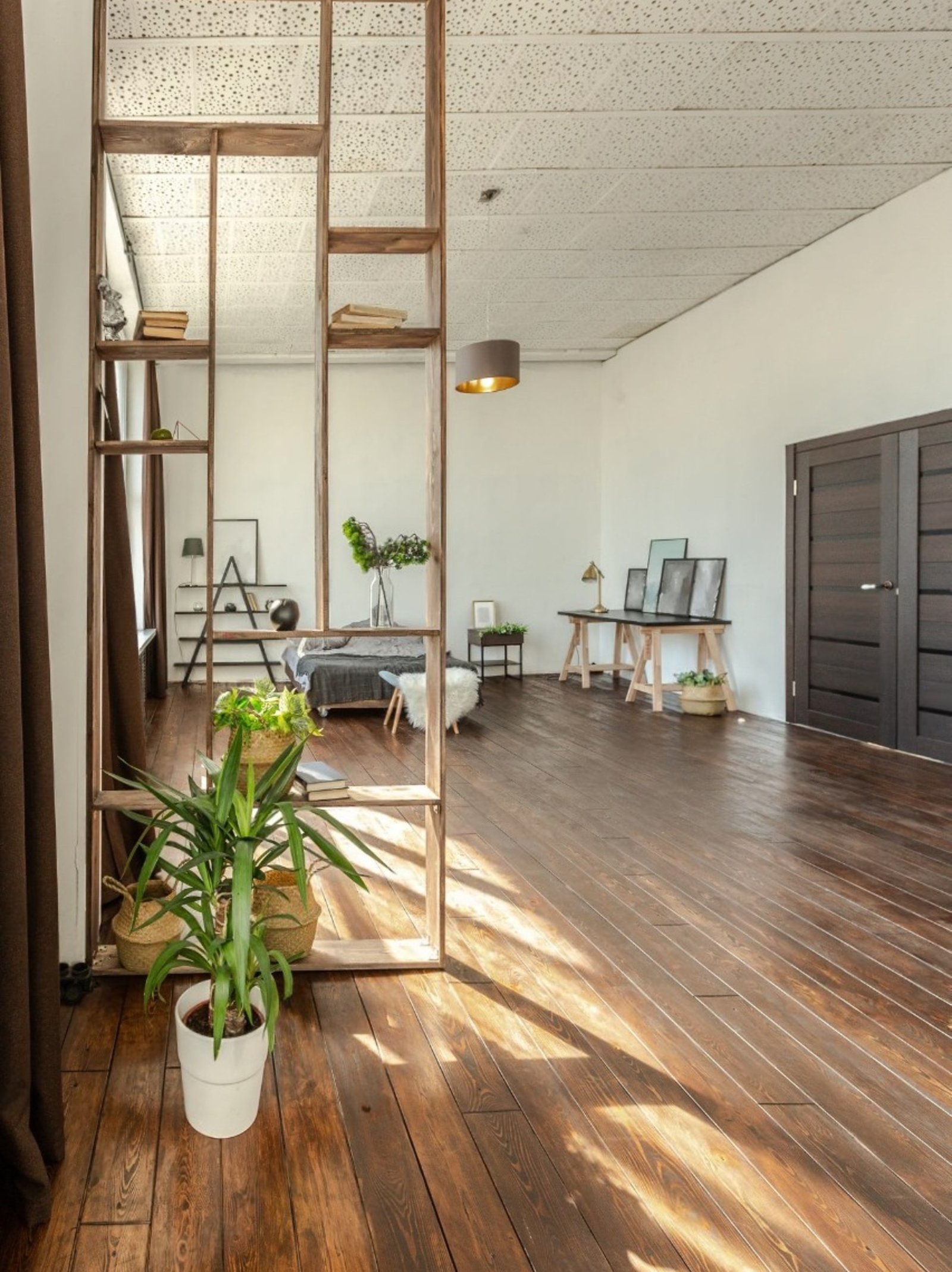 spacious-studio-apartment-decorated-with-wood-white-minimalist-design-with-huge-windows-sunlight-kitchen-area-living-area_267786-3565